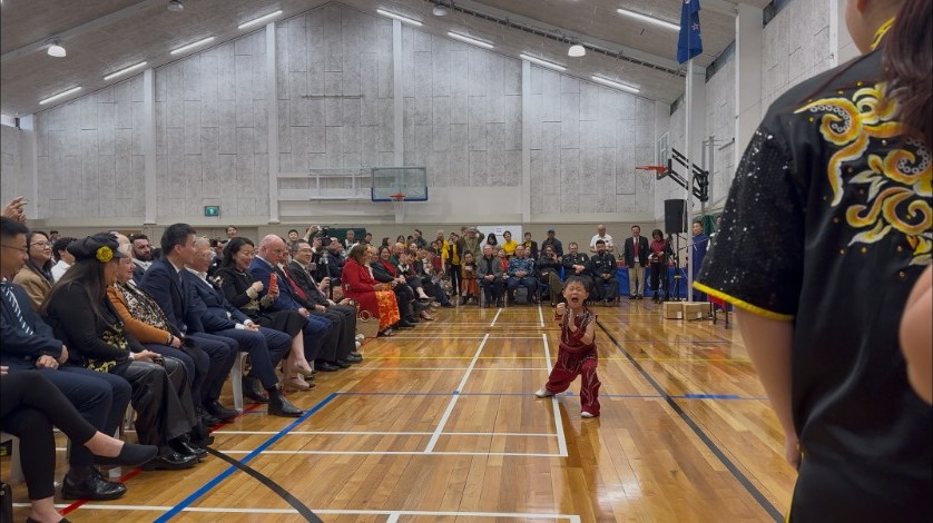 A young Wushu athlete performs for guests including Prime Minister Christopher Luxon